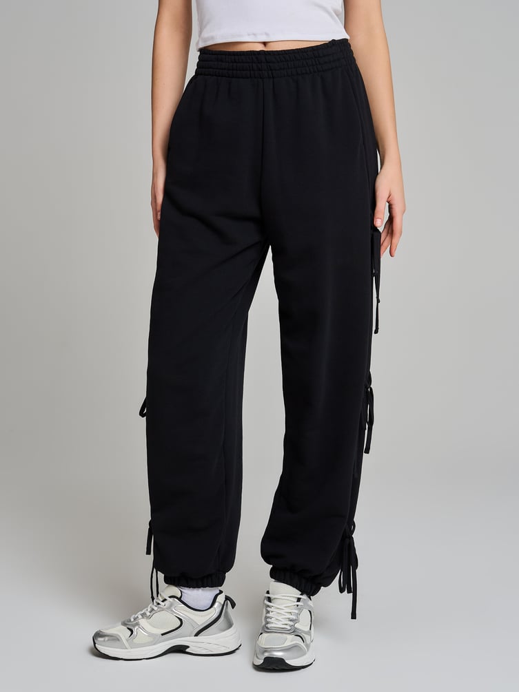 Брюки джоггеры с завязками по бокам