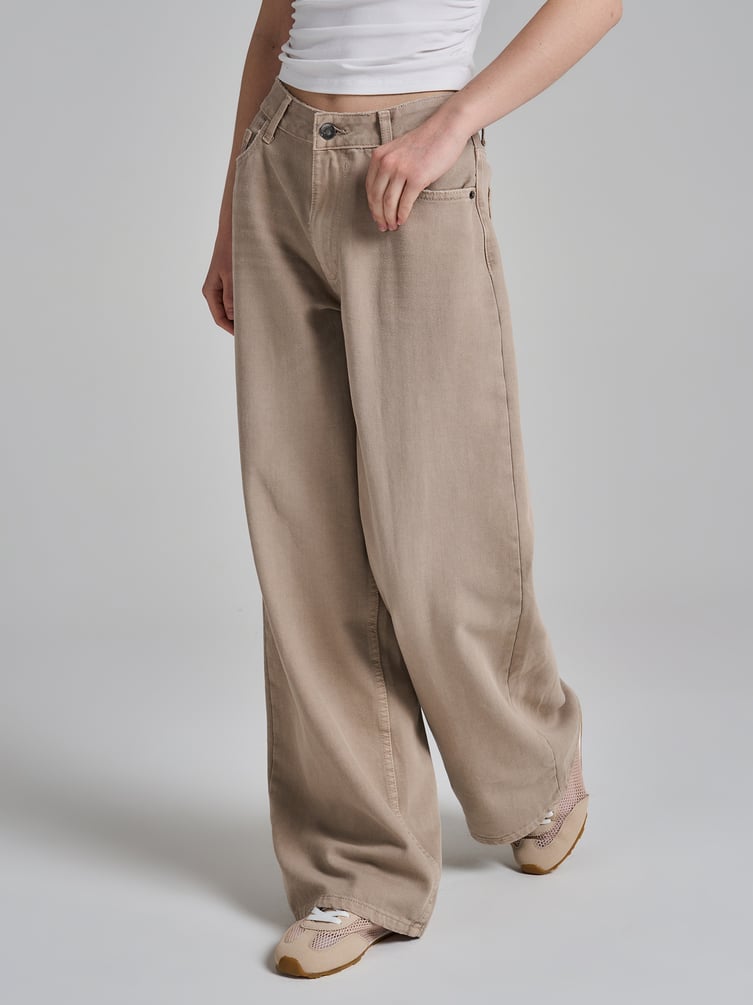 Джинсы широкие с вареным эффектом