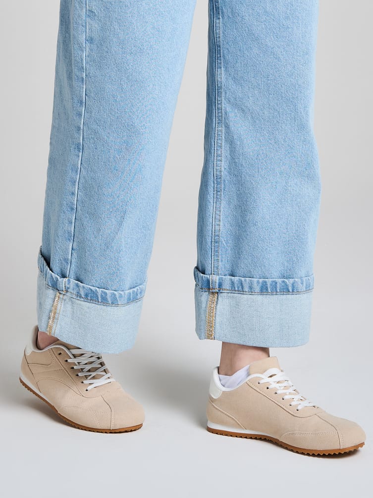 Джинсы широкие с подворотами