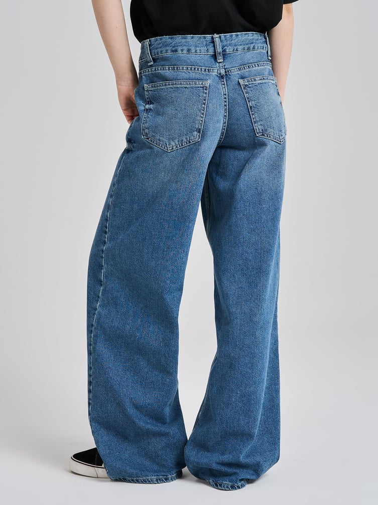 Джинсы багги с вареным эффектом