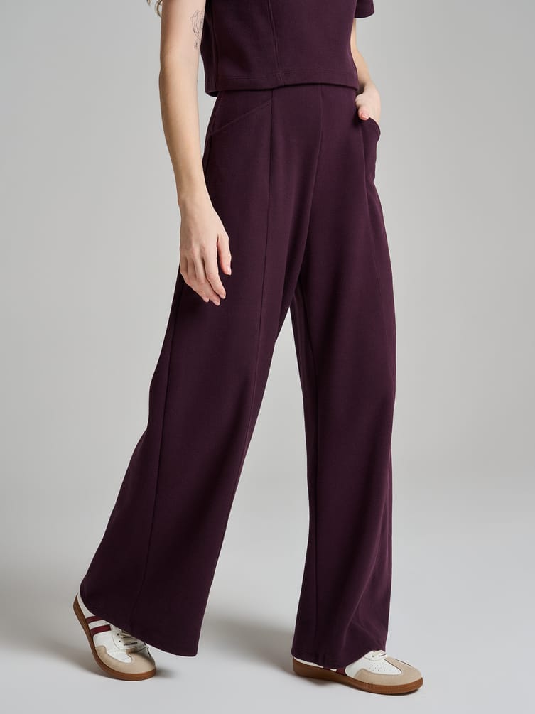 Широкие брюки в рубчик со стрелками