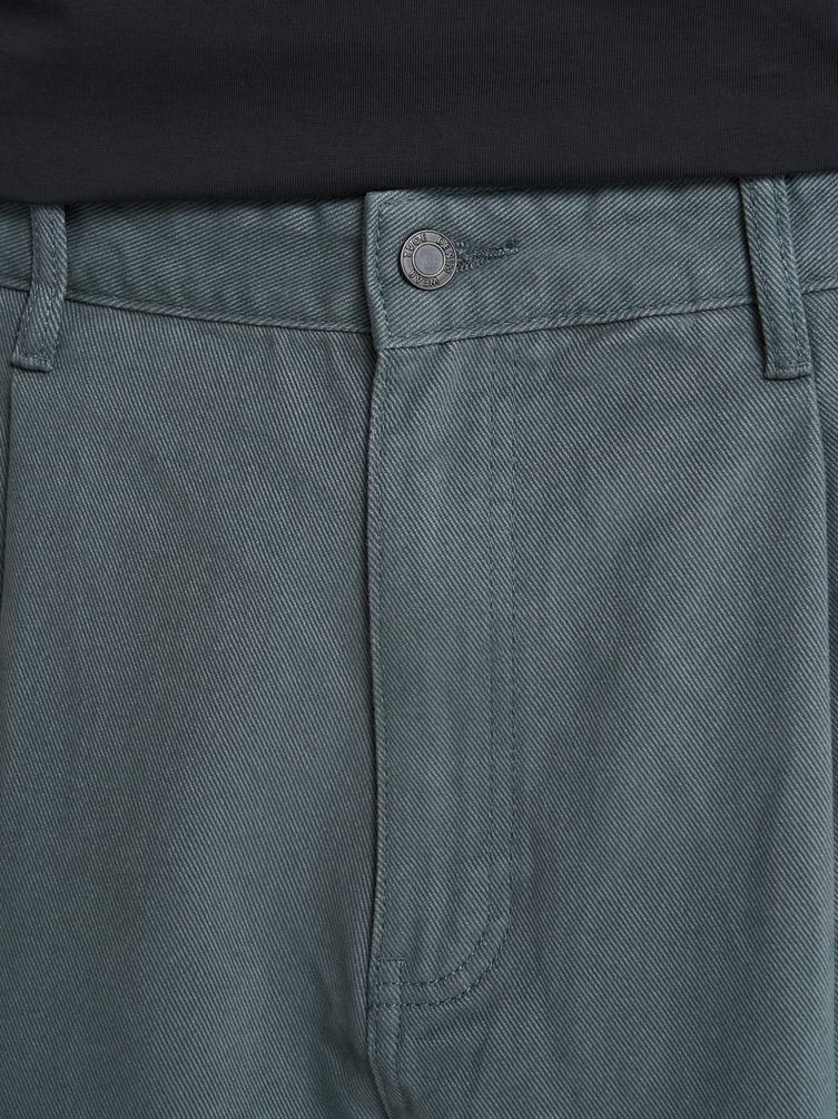 Зауженные широкие брюки