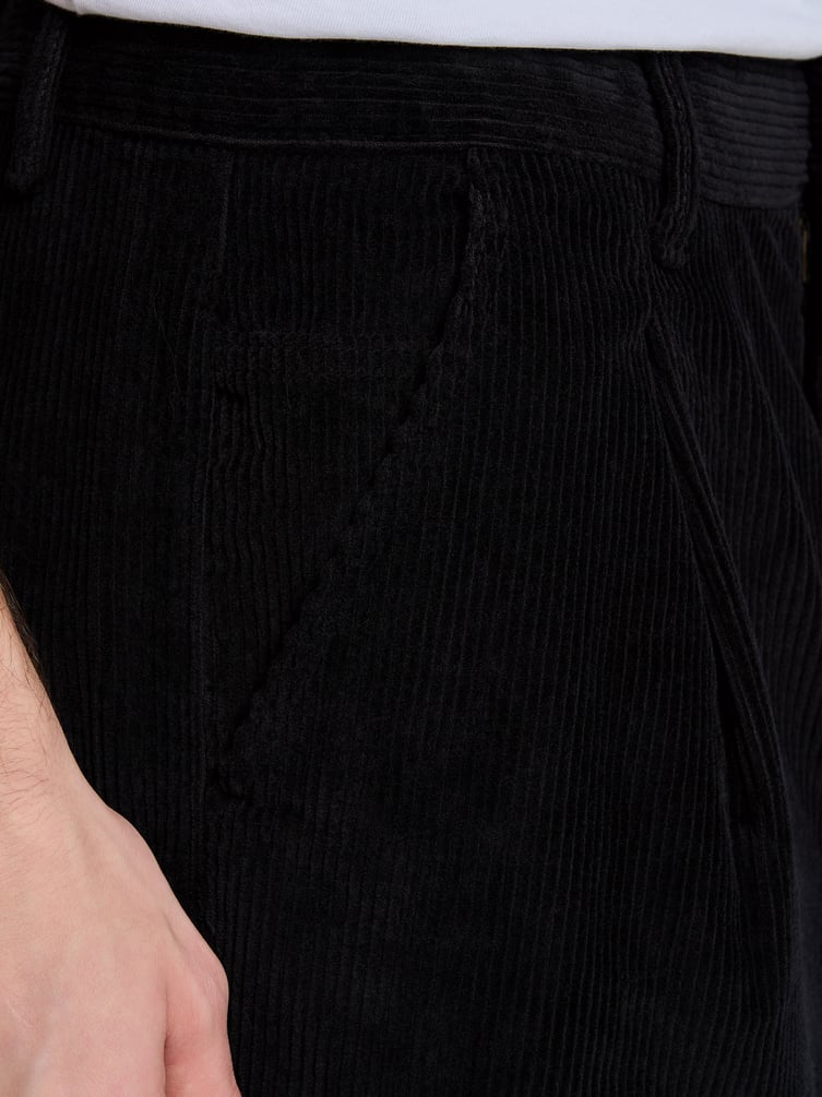 Вельветовые зауженные брюки