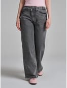 Джинсы широкие с асимметричной застежкой