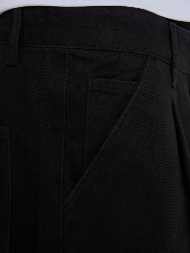 Зауженные широкие брюки