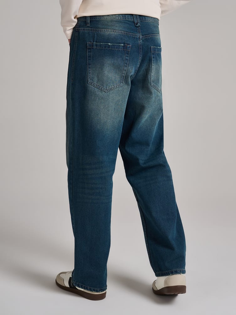 Джинсы багги с декоративным смещенным швом