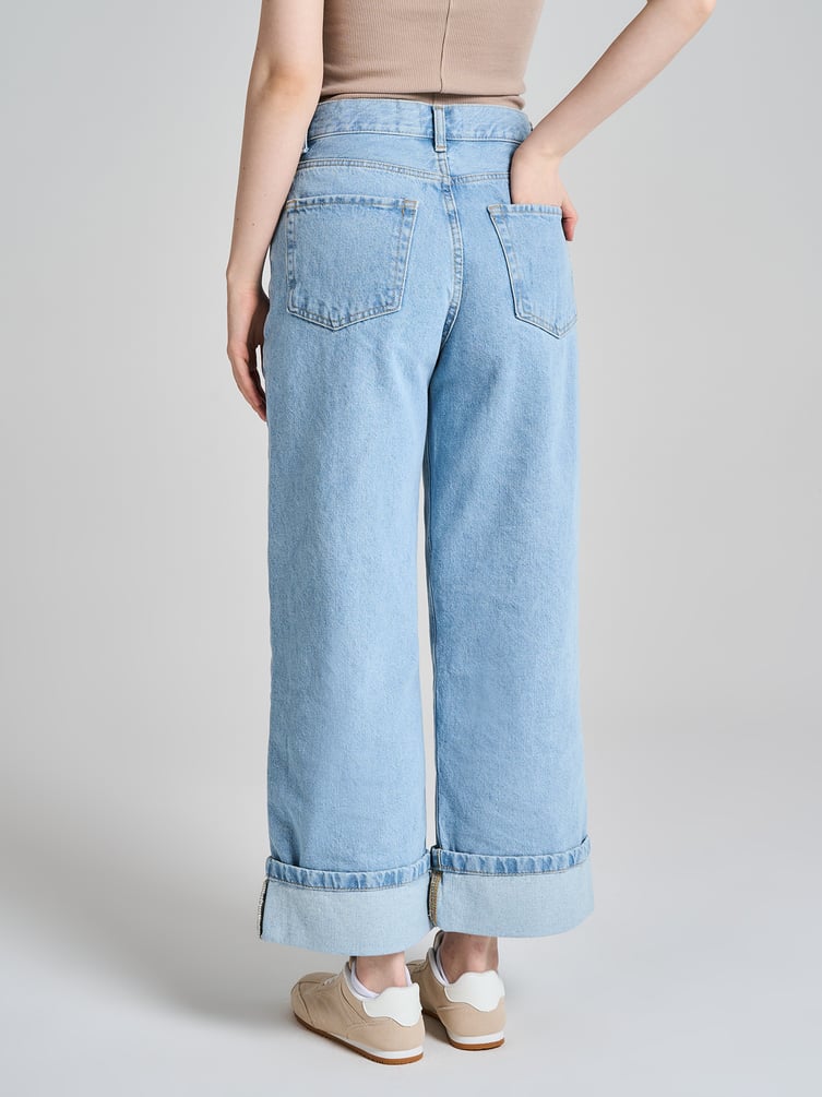 Джинсы широкие с подворотами