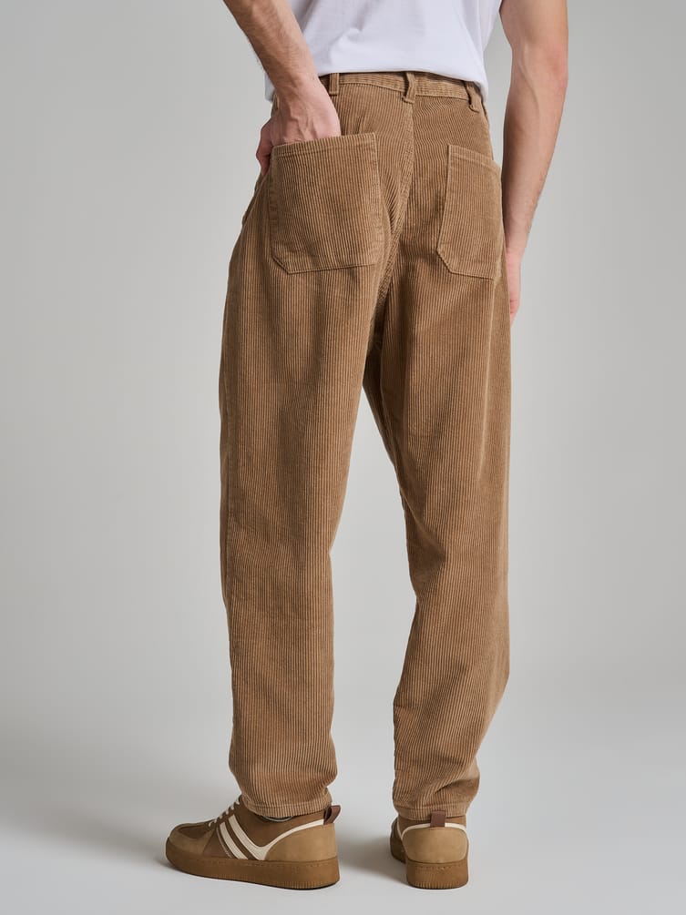 Вельветовые зауженные брюки