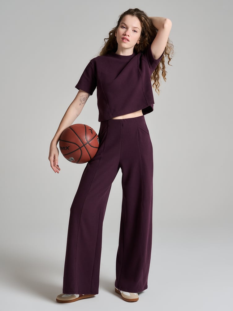 Широкие брюки в рубчик со стрелками