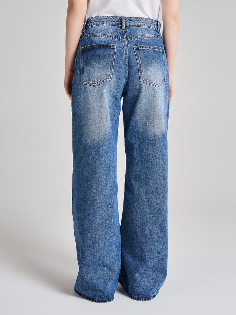 Джинсы широкие