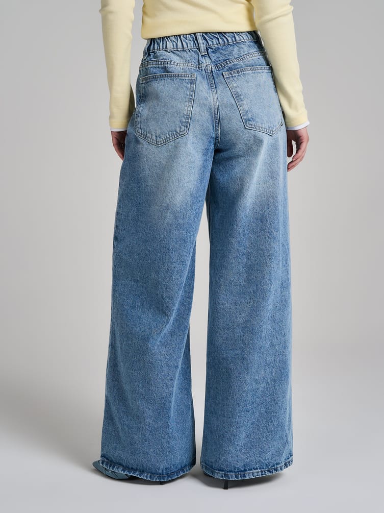 Джинсы широкие на резинке