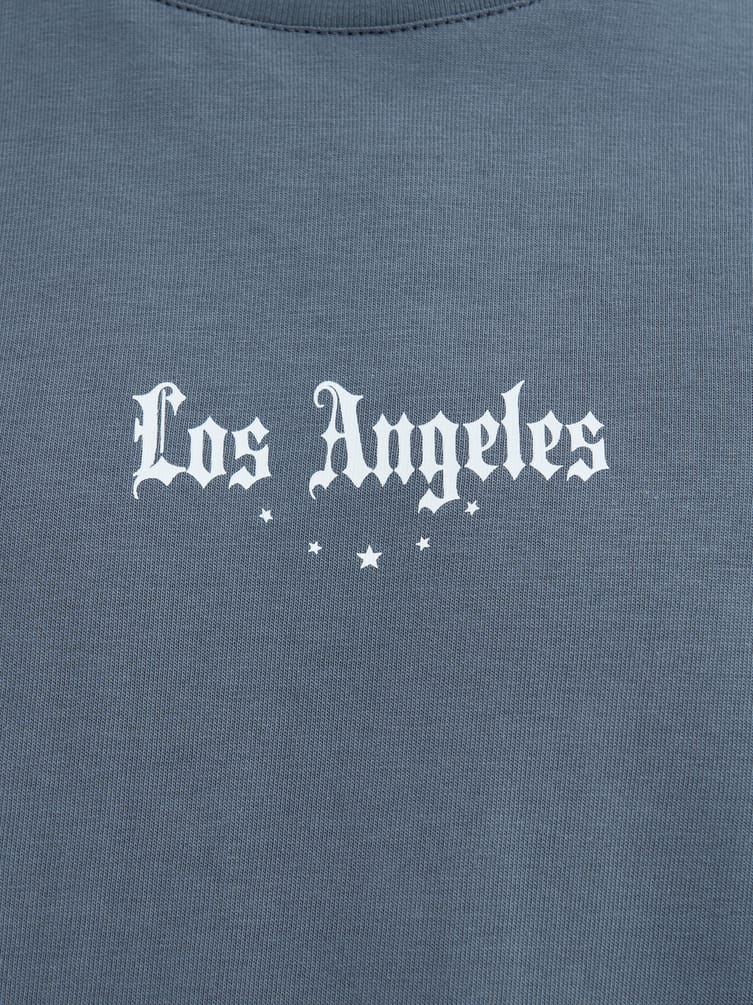 Футболка оверсайз с принтом ангелов на спине