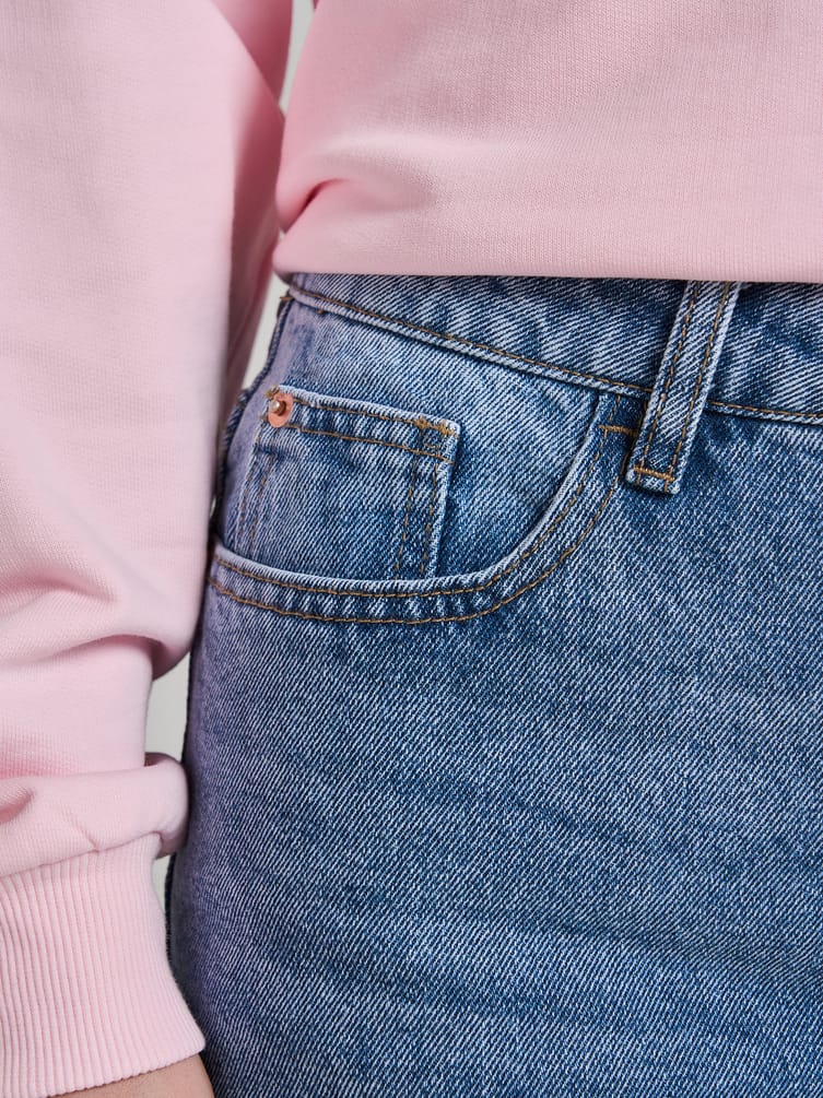 Джинсы зауженные с необработанными краями