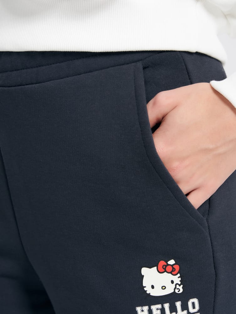 Утепленные брюки клеш с принтом Hello Kitty и начесом