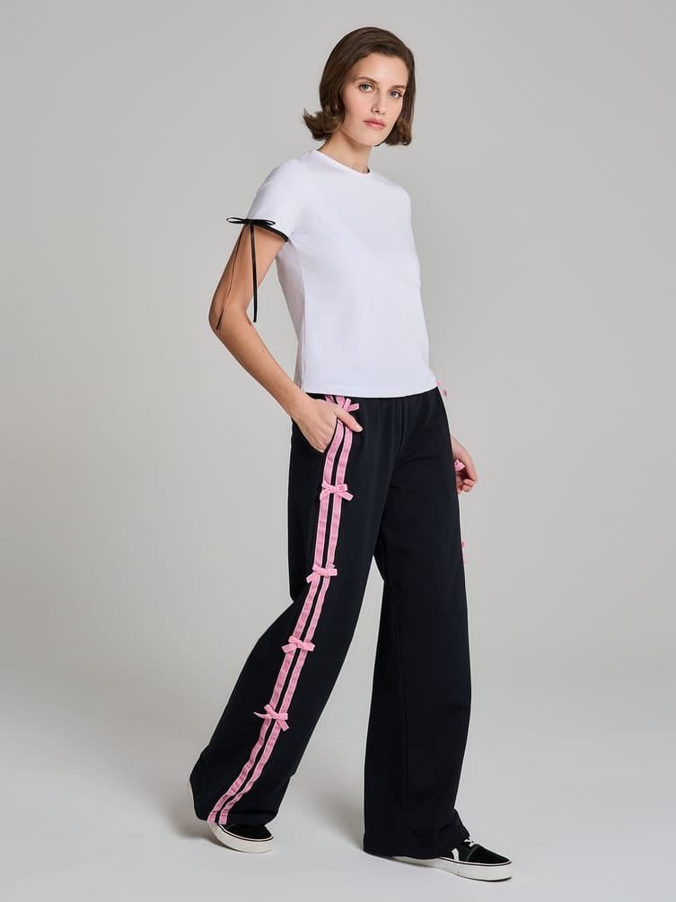 Повседневные брюки оверсайз с лампасами и бантиками