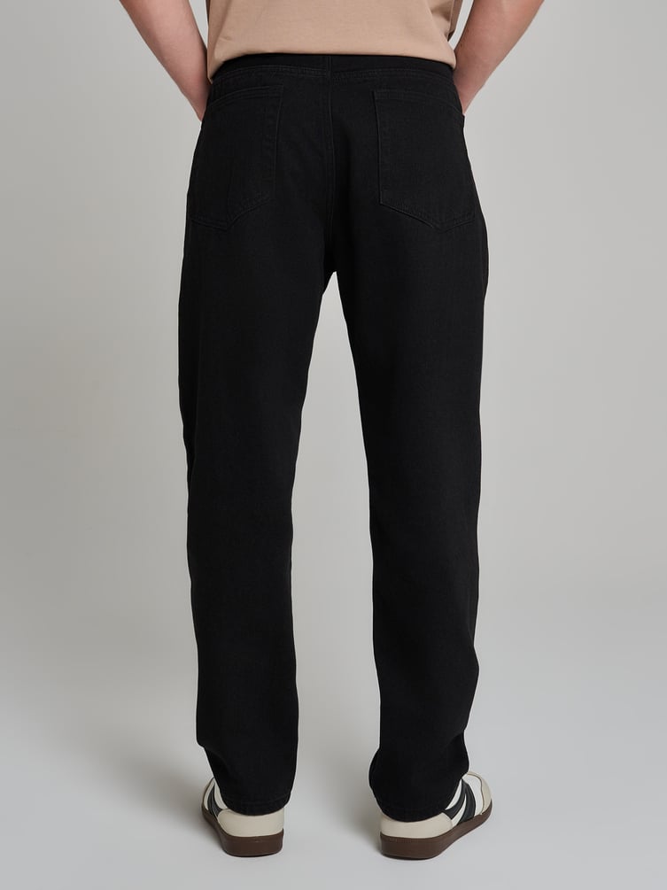 Джинсы зауженные Carrot