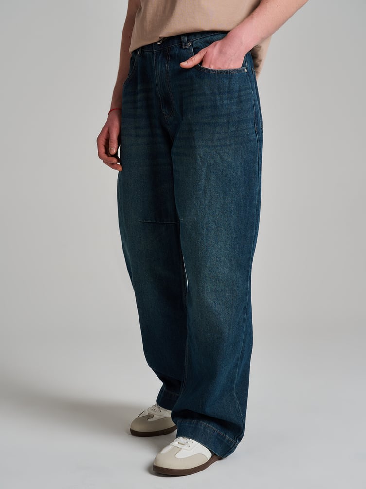 Джинсы широкие