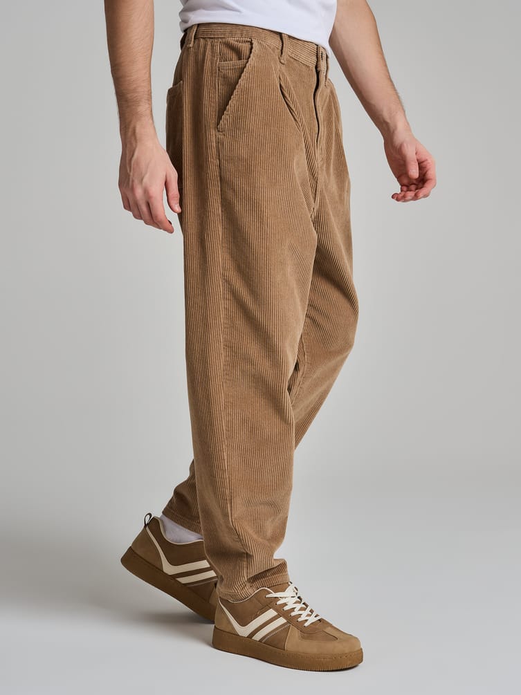 Вельветовые зауженные брюки