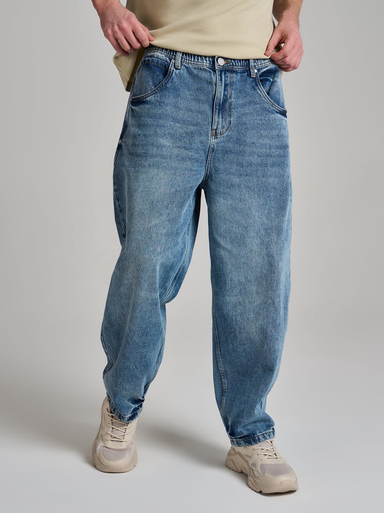 Джинсы багги с вареным эффектом