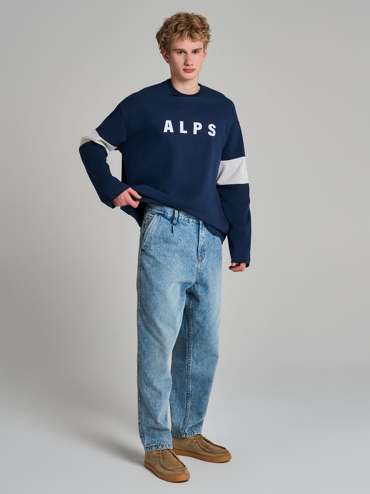 Зауженные джинсы бананы