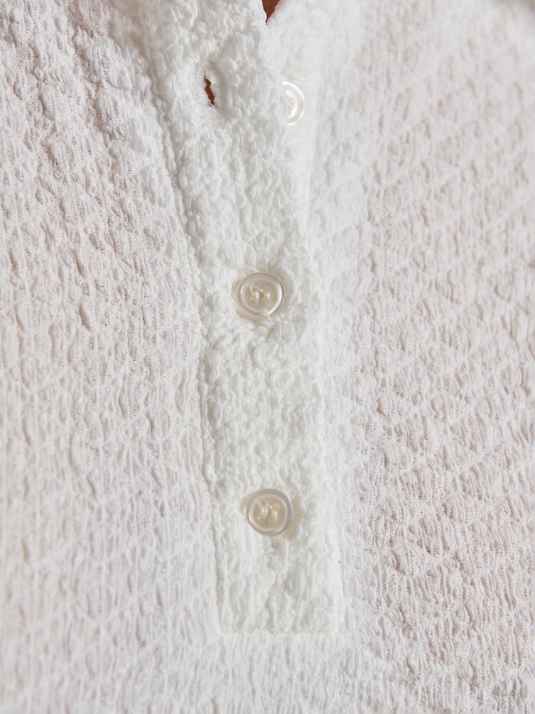 Поло с длинным рукавом их жатого материала