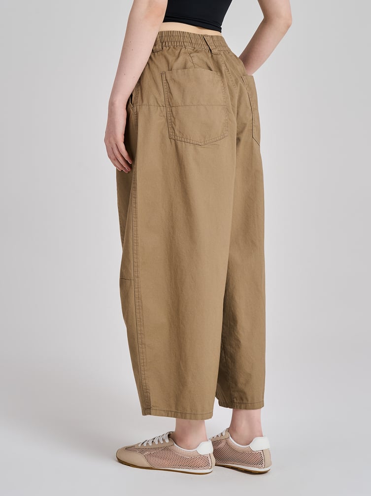 Брюки-бананы с защипами