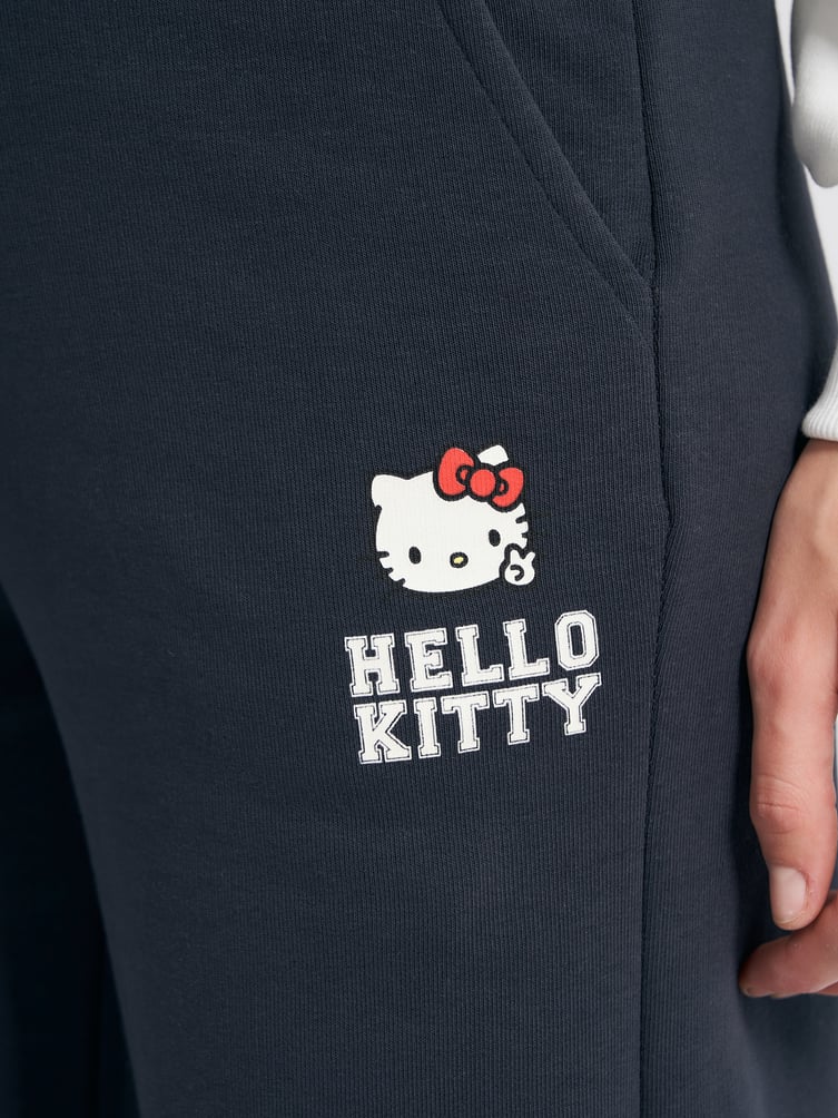 Утепленные брюки клеш с принтом Hello Kitty и начесом